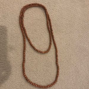 Beaded by W long brown necklace!
